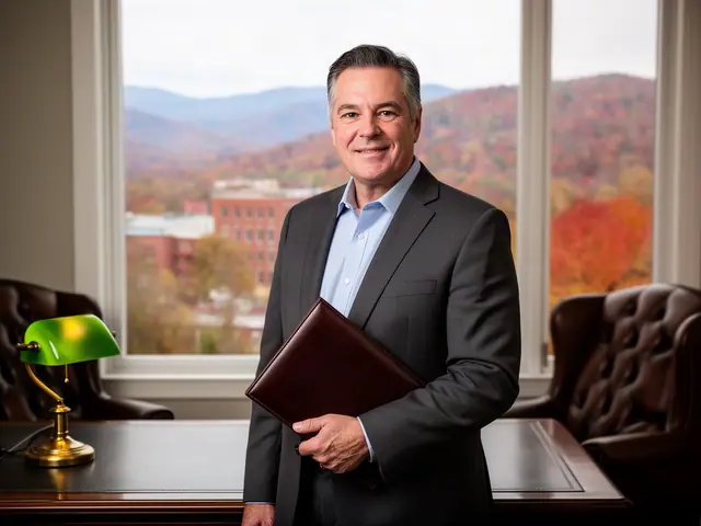 An attorney holding a leather portfolio in a warm office.